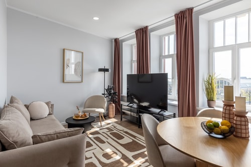 1-Bedroom Apartment with River & Market Views