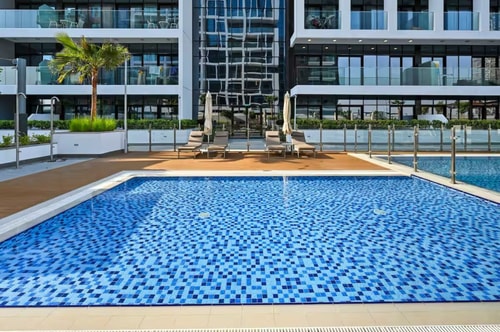 French Riviera Style Apt | Pool, Gym & Chic Vibe, photo 25 of 27