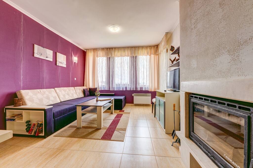 Colorful 2BD Apartment with Indoor Fireplace Flataway