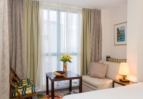 Sunny Studio in Hotel Berlin, Steps from the Beach 1 Flat Manager Booking