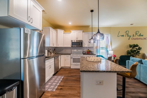 Uptown Charlotte 3BR | Hot Tub + Fire Pit 11 Dwell