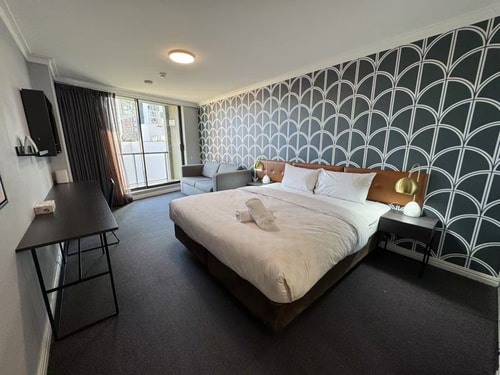 KozyGuru | Haymarket | Buzzy City Abode