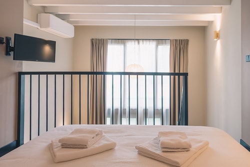 Deluxe room with mezzanine and patio at LVM STAYS 18 LVM Stays
