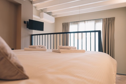 Deluxe room with mezzanine and patio at LVM STAYS 25 LVM Stays