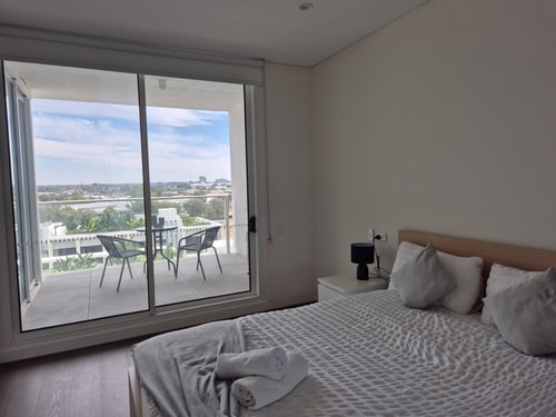 Olympic Park 1BR: Pool, Gym & Free Secure Parking 21 Serain Residences