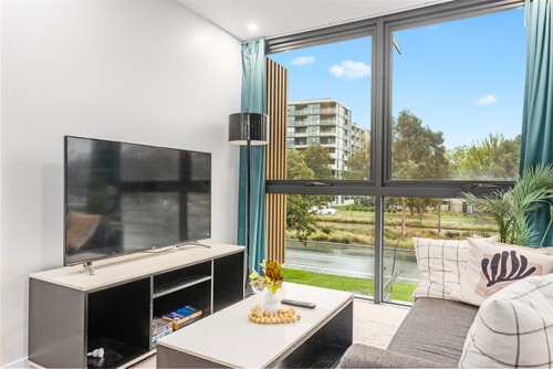 Cozy 1BR Apartment | Walk to Tram | Parking 13 Serain Residences