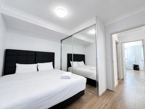 7 Min to Train: Central Parramatta 2BR + Parking 3 Serain Residences