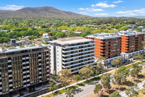 Charming 2BR Apartment | Walk to Tram | Parking 11 Serain Residences