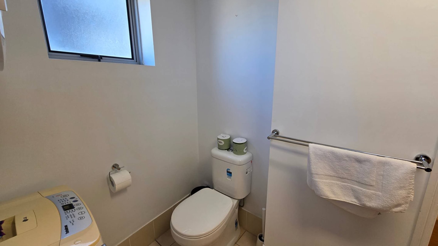 Comfy 1BR + Free Parking |  Stroll to Parklands 15 Serain Residences