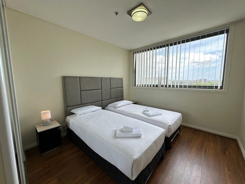 Cozy 2-Bedroom Apt 6 minutes to Paramatta Train 13 Serain Residences