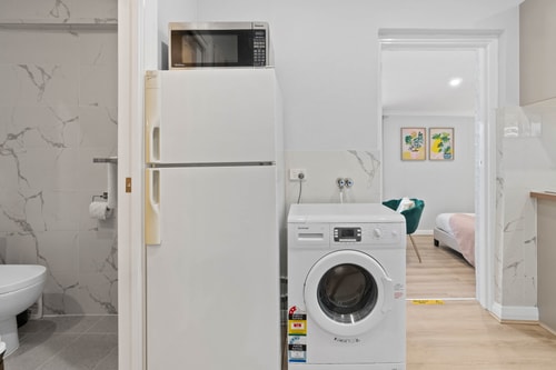 Stylish 2BR Retreat | Walk to Shops & 12min to CBD 13 Serain Residences