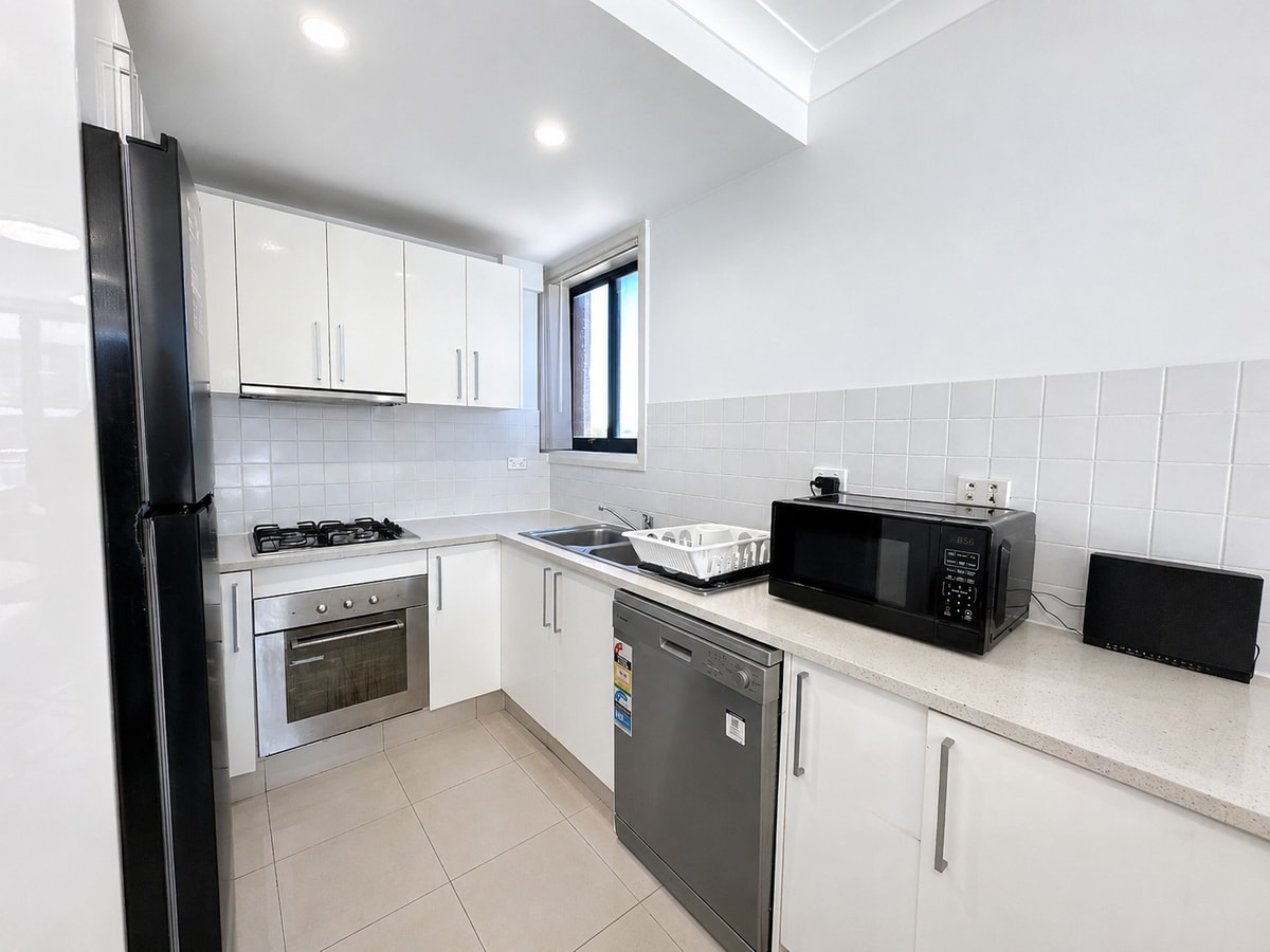 7 Min to Train: Central Parramatta 2BR + Parking 10 Serain Residences
