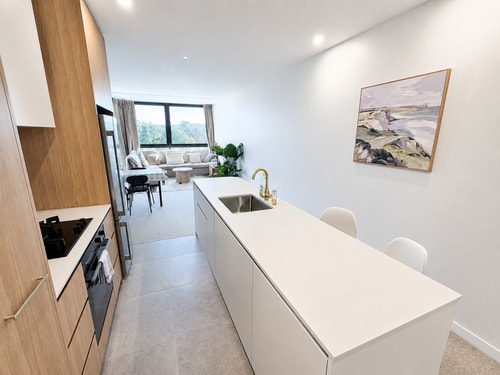 Comfy 2BR EV Friendly Stay | 7-Min Walk to Tram 2 Serain Residences