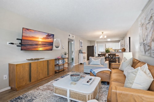 Beach Escape • Pool View • Walk to Beach + Food