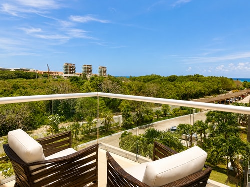 Oceanview Penthouse Steps from the Private Beach