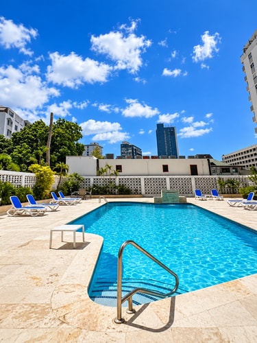 Walk to Beach • Pool + Gym Access • Balcony