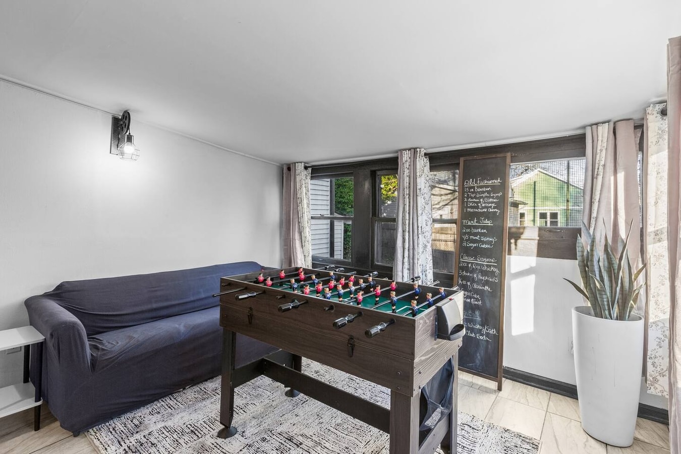 Enclosed Porch, Game Room & Workspace · 2