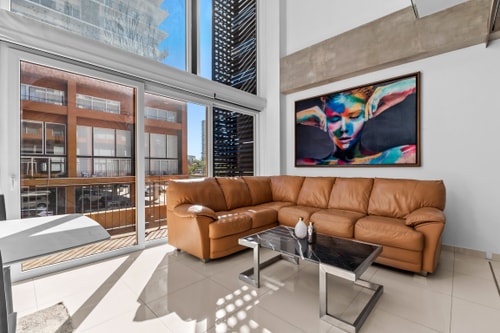 Double-height loft in Zoho Skies | Rooftop pool