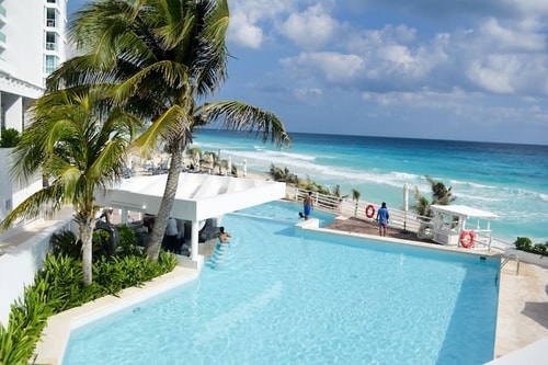 Estudio 4 sobre playa, alberca, gimnasio, jacuzzi relaxico