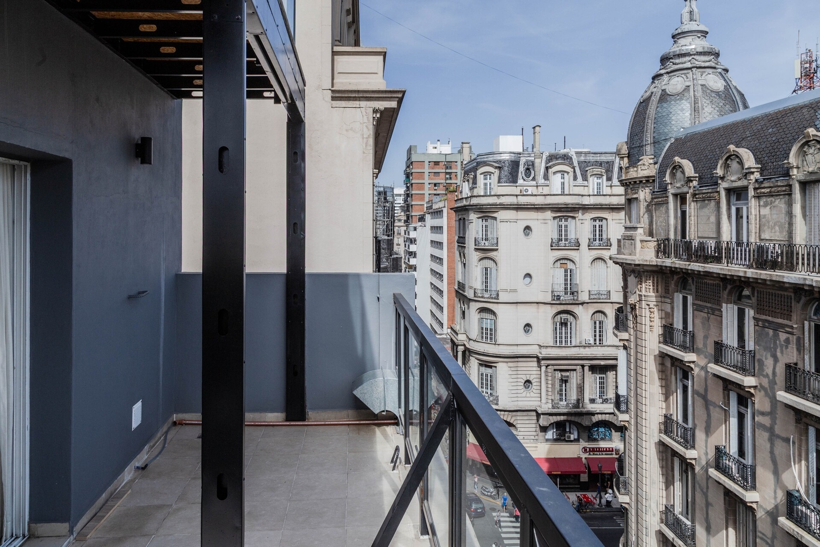 Balcony overlooking historic façades and a street in Buenos Aires