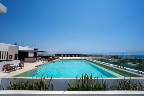 Beautiful & Central Apt w/ Infinity Pool Rooftop 42 Solmar Rentals