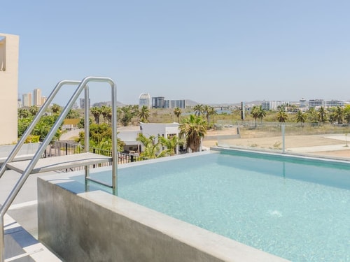 Modern Apartment with Pool, 5 min from the Beach 6 Mahara Vacation