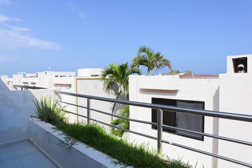 Condo with Balcony & Partial Ocean View at Marlin 14 El Corazon del Caribe