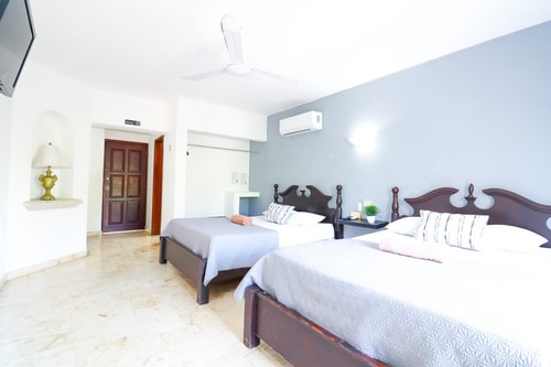 "Spacious Room with Two Double Beds" 1 El Corazon del Caribe