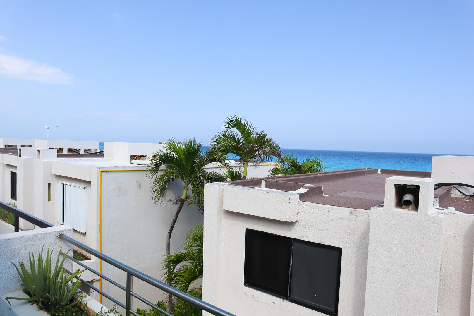 Condo with Balcony & Partial Ocean View at Marlin 1 El Corazon del Caribe