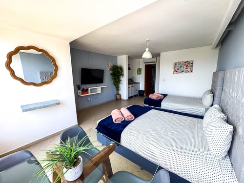 Condominio con vista al atardecer con acceso al mar y albercas El Corazon del Caribe
