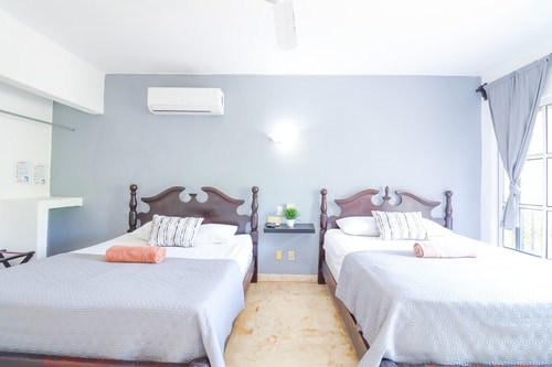 "Spacious Room with Two Double Beds" 3 El Corazon del Caribe