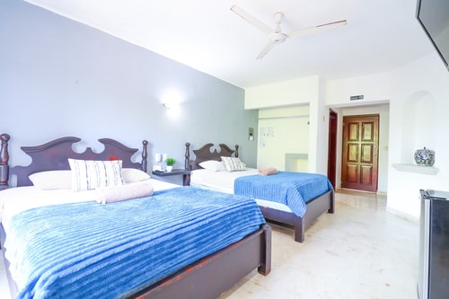 "Spacious Room with Two Double Beds" 2 El Corazon del Caribe