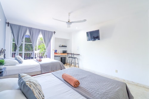 "Spacious Room with Two Double Beds" 11 El Corazon del Caribe