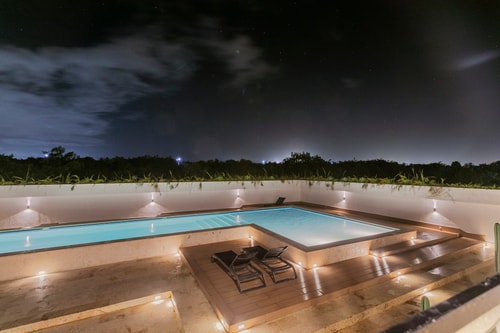 Best location Luxury 2BD with terrace in village 77 Airbnb Property Manager Cancun