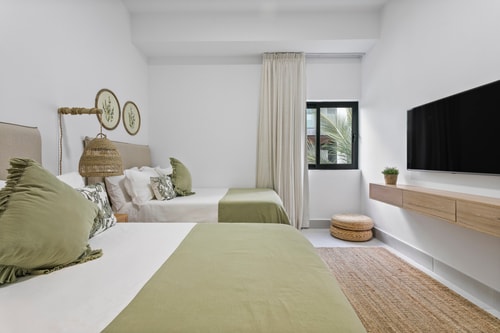 Best location Luxury 2BD with terrace in village 63 Airbnb Property Manager Cancun