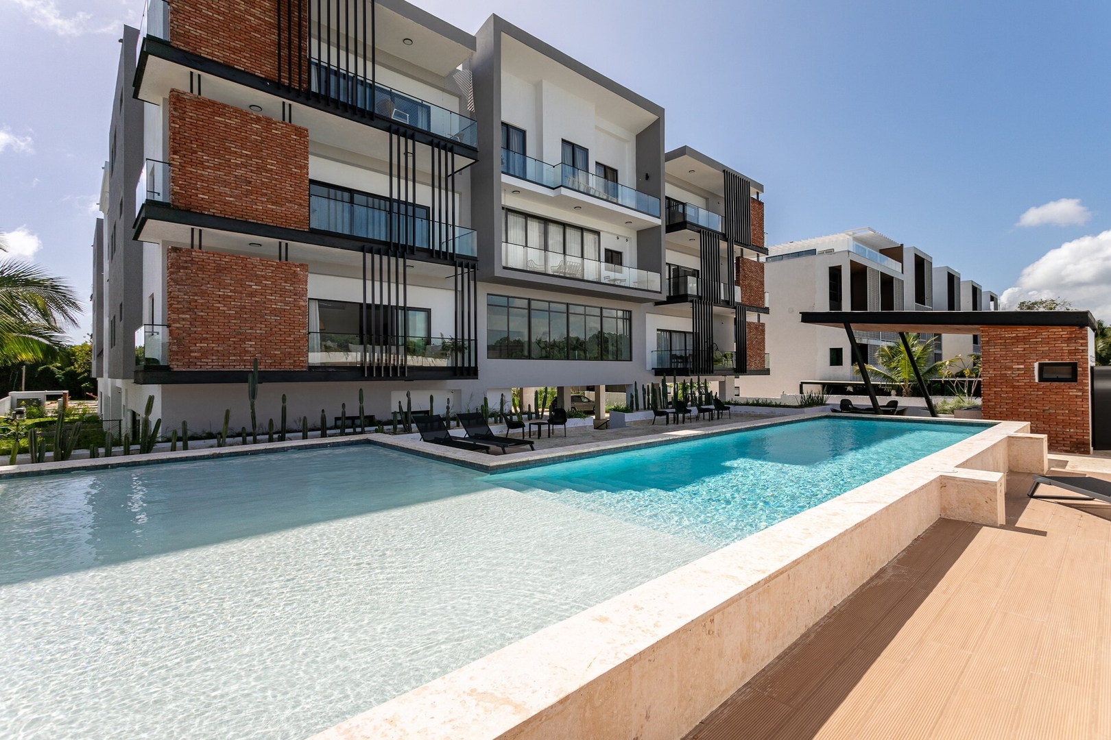 Best location Luxury 2BD with terrace in village 49 Airbnb Property Manager Cancun