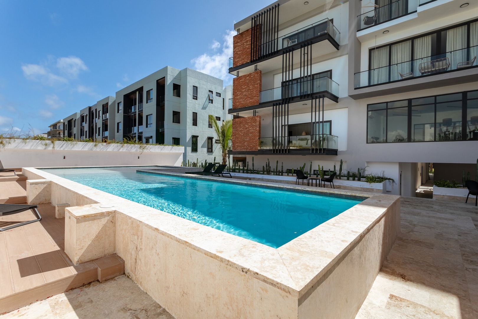 Best location Luxury 2BD with terrace in village 42 Airbnb Property Manager Cancun