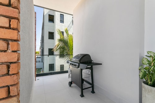 Best location Luxury 2BD with terrace in village 23 Airbnb Property Manager Cancun
