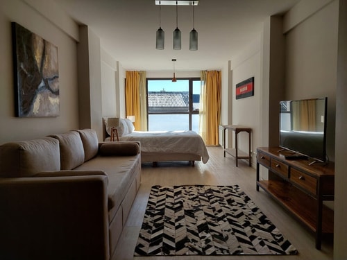 Hermoso estudio de diseño céntrico 1