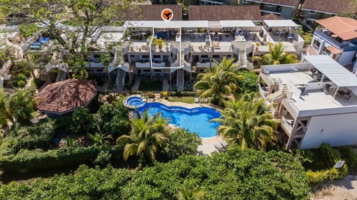 Sunset Rooftop Oasis | 2BR Condo | Steps to Beach