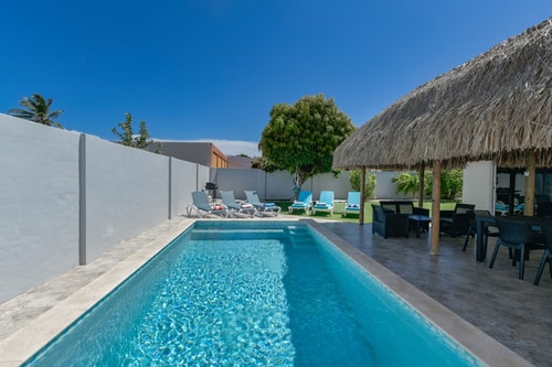 Luxury 3BR Villa • Pool • Walk to Palm Beach Aruba Local Rental