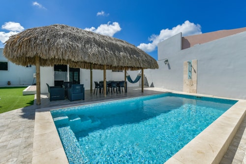 Luxury 2BR Villa • Pool • Walk to Palm Beach 3 Aruba Local Rental