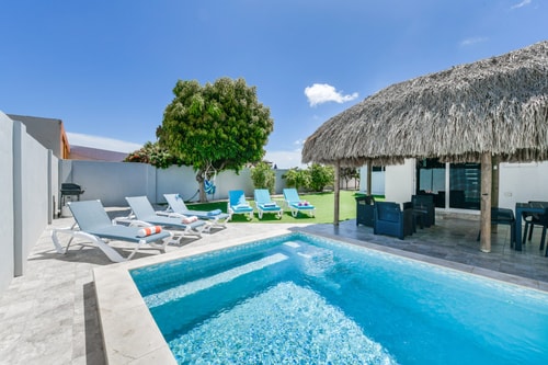 Luxury 2BR Villa • Pool • Walk to Palm Beach 17 Aruba Local Rental