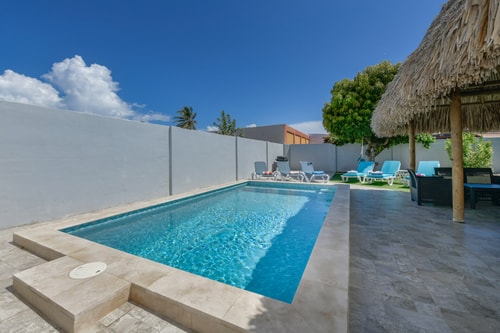 Luxury 2BR Villa • Pool • Walk to Palm Beach 19 Aruba Local Rental