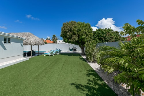 Luxury 2BR Villa • Pool • Walk to Palm Beach 11 Aruba Local Rental