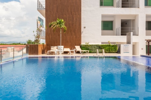 Spacious Apartment with Pool & BBQ Area