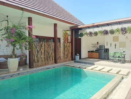 4BR Family Villa w/ Pool, Games, & Spa Room 7 Bali Real Estate