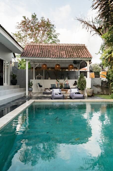 Soak Up the Light, Glass, and Greenery at a Tropical Cocoon