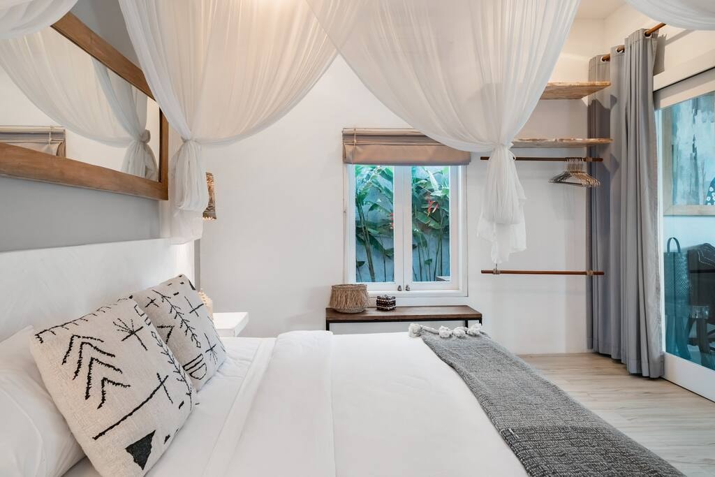 Soak Up the Light, Glass, and Greenery at a Tropical Cocoon