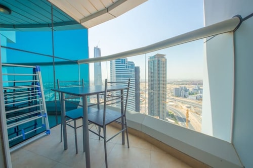 Modern furnished studio with balcony in JLT - BRK Luxury Escapes